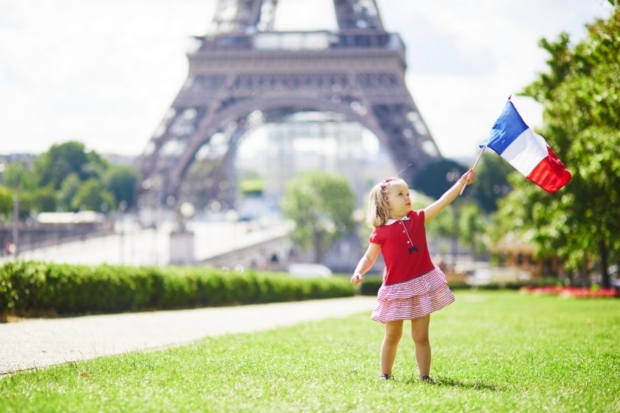 French Girl Holding a Flag